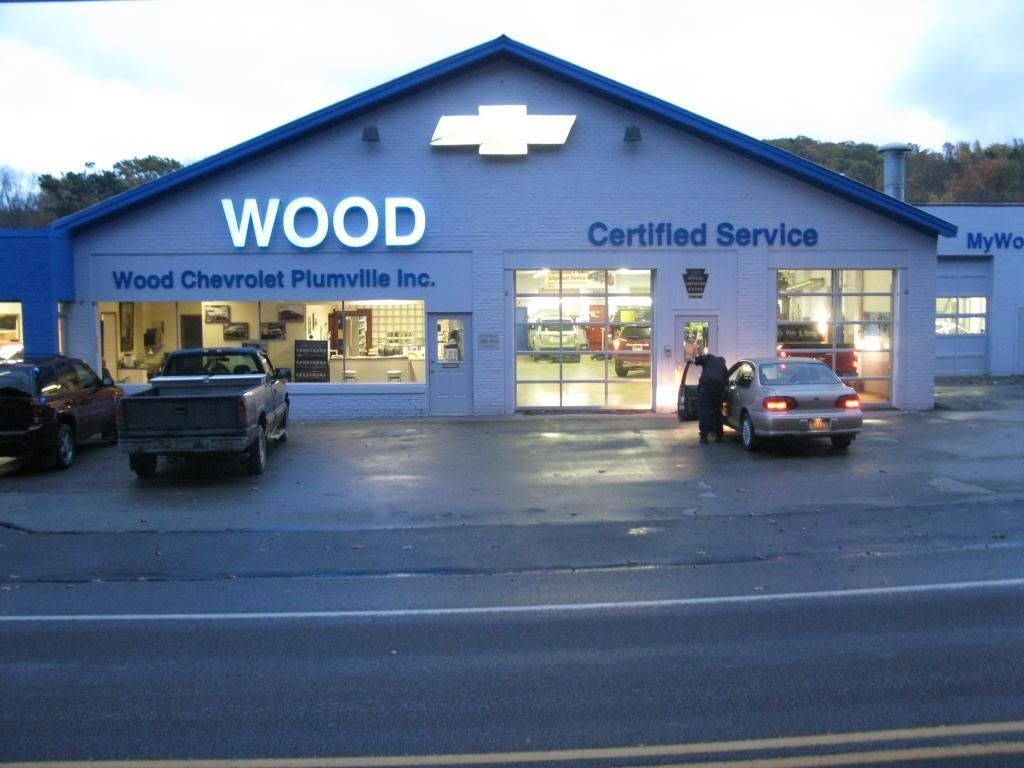Wood Chevrolet Plumville showroom evening view